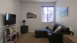 Guest bedroom with full size sofa sleeper and memory foam mattress, 42 HDTV